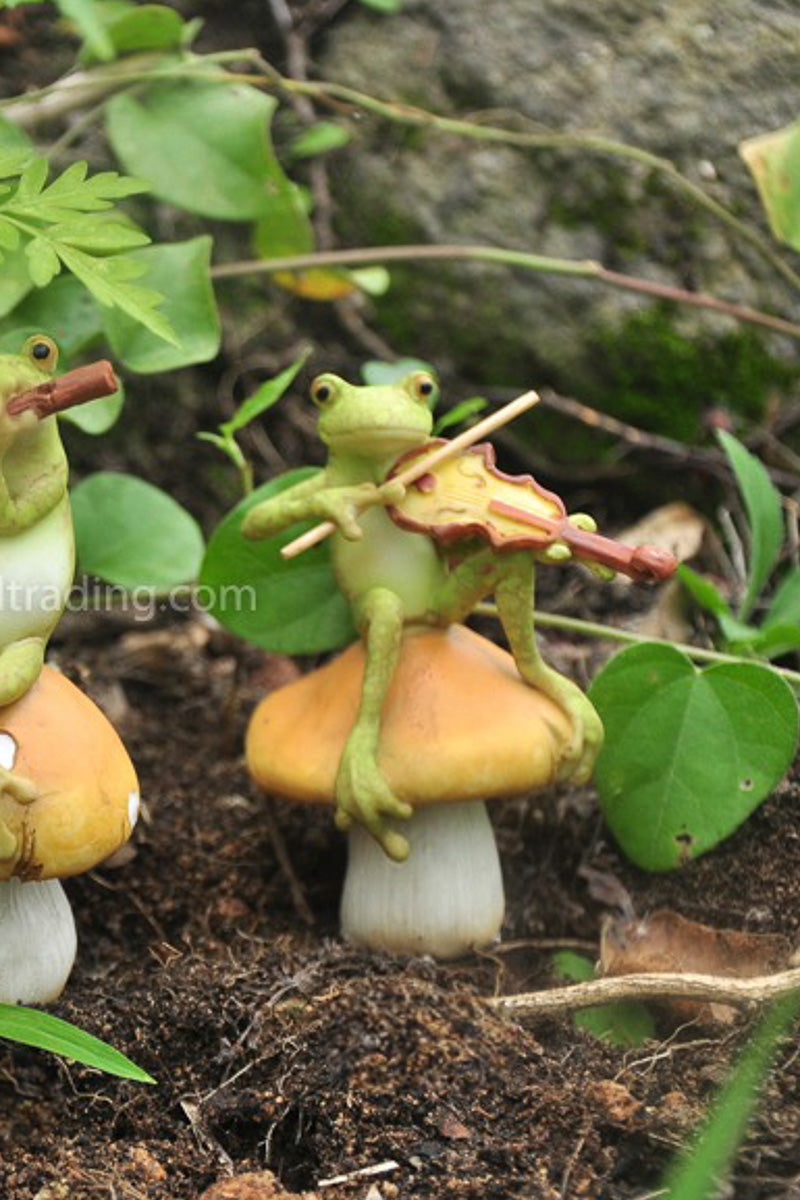 Miniature Garden Frog Playing Fiddle On Mushroom