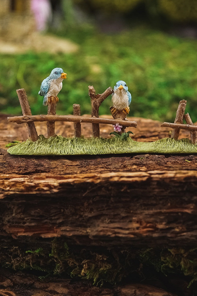 Miniature Garden Birds On Fence