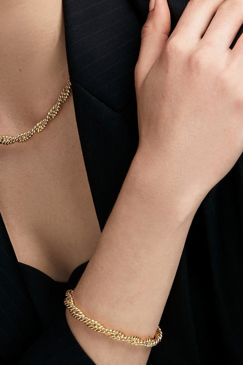 Rho Braided Twisting Links Bracelet Gold